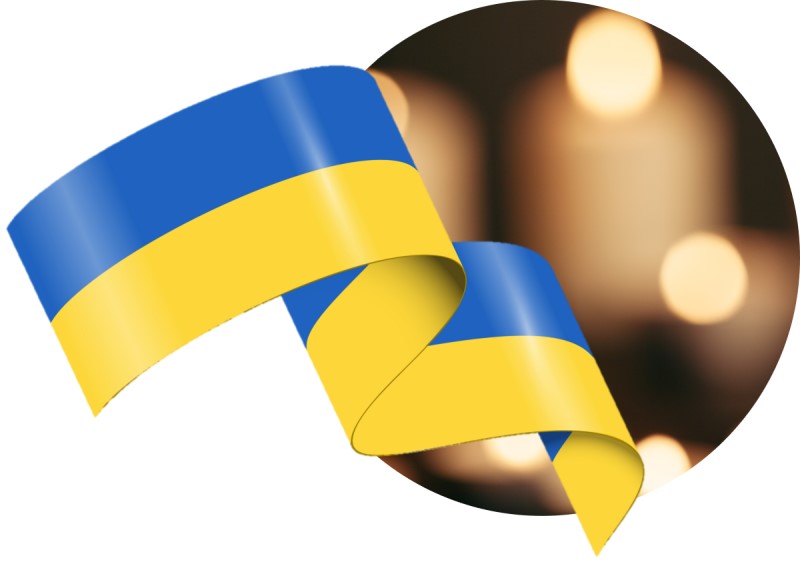 Kuvituskuva kynttilöistä ja Ukrainan lippunauhasta